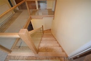 bespoke wood and glass staircase design