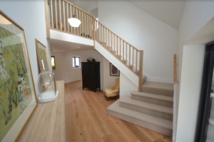 carpeted stairs & oak balustrade after 5