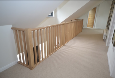 carpeted stairs & oak balustrade after 3