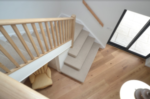 carpeted stairs & oak balustrade after 2